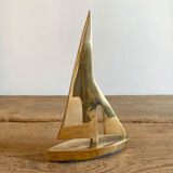 Golden brass sailboat