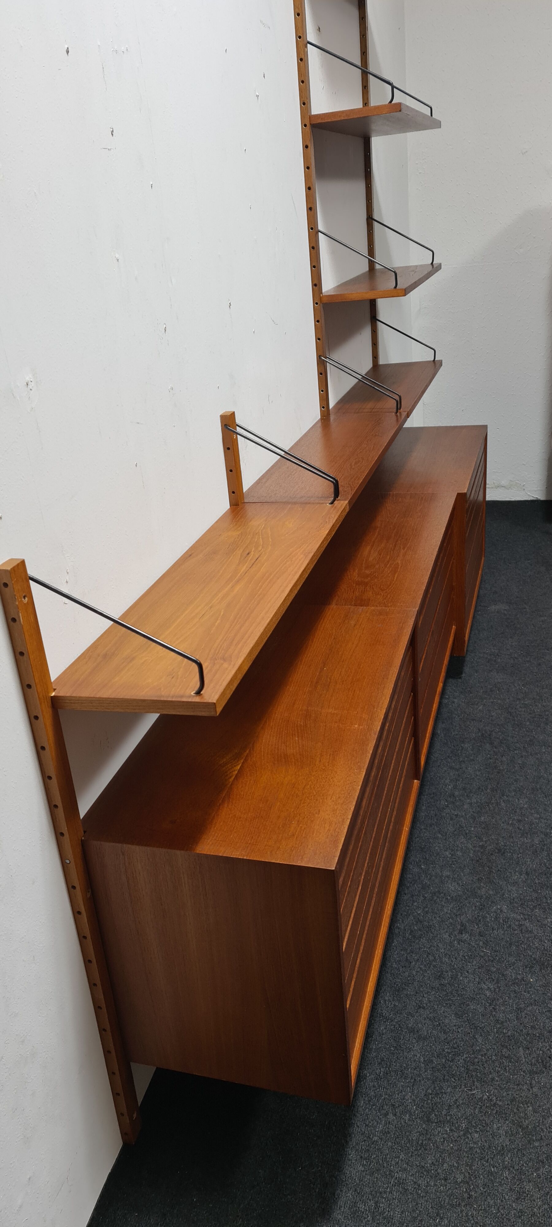 Teak wall unit by Poul Cadovious