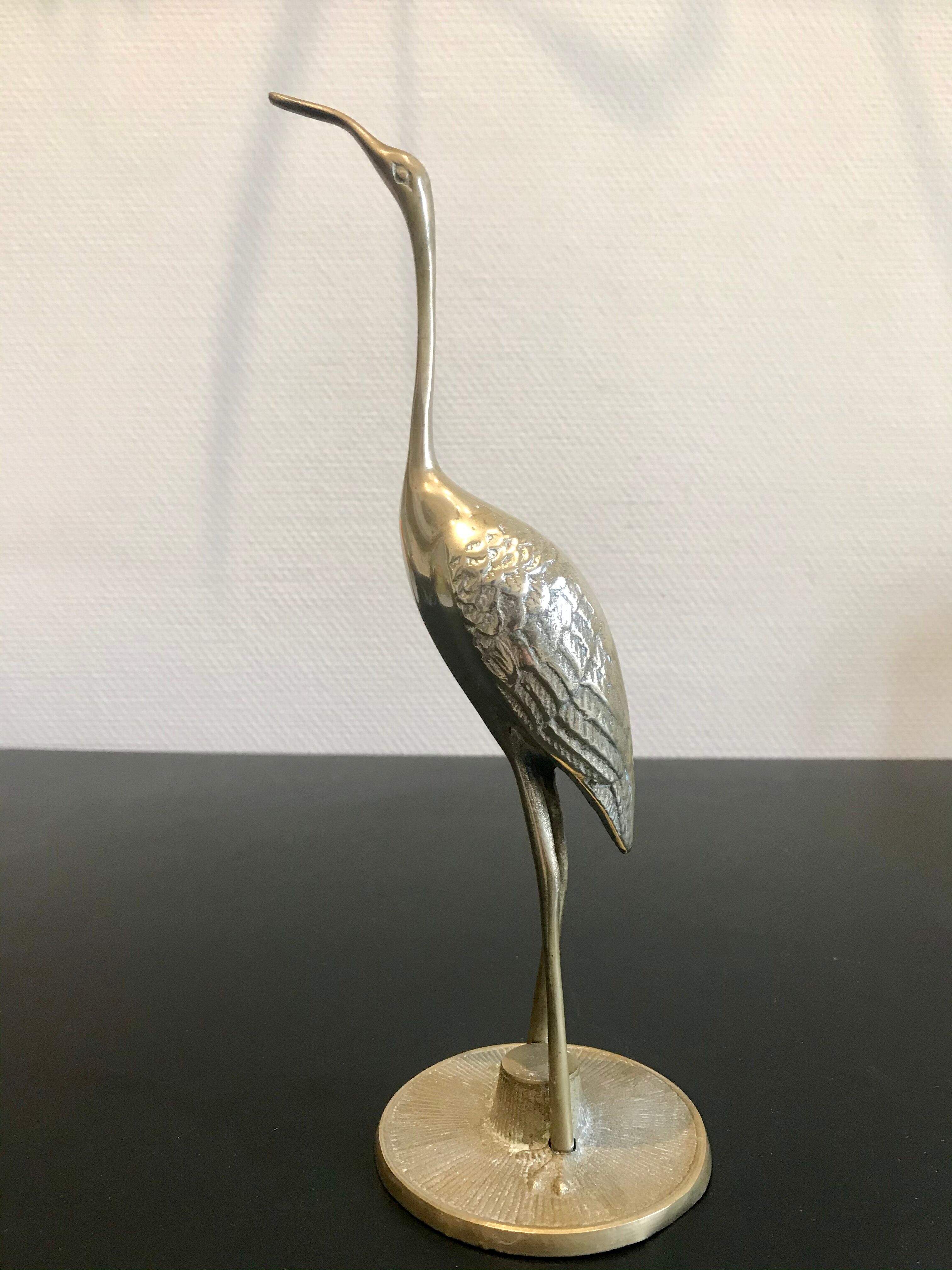Couple of brass birds