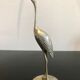 Couple of brass birds