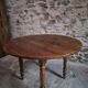 French antique round dining table in walnut, circa 1880–1900.