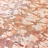 Round table in red marble by Eero Saarinen for Knoll