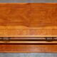 Vintage yew wood library/buffet with three drawers.