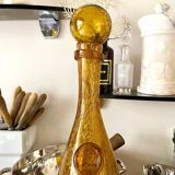 Biot "Narrow Bottle 45" in golden yellow bubbled glass