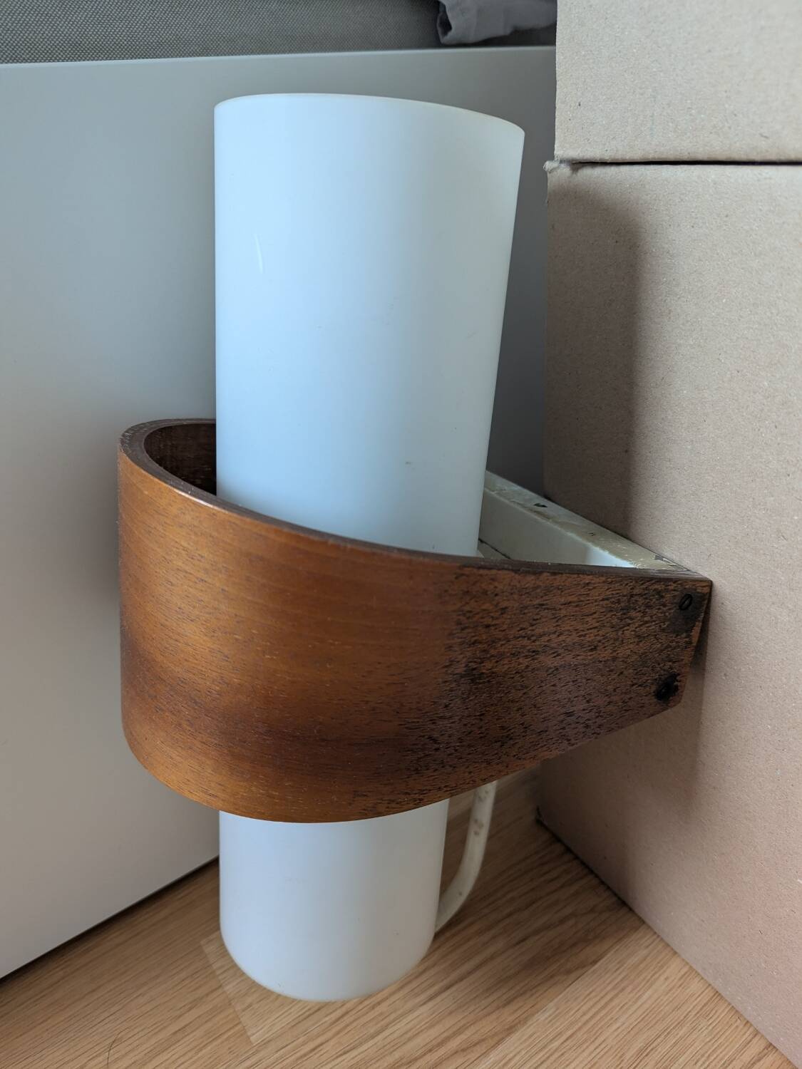 Pair of Louis Kalff NX40 teak and glass wall lights for Philips
