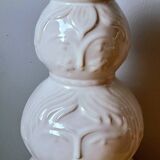 Totem vase faces in ceramic