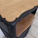 Chiffonnier en bois brut et peint en noir