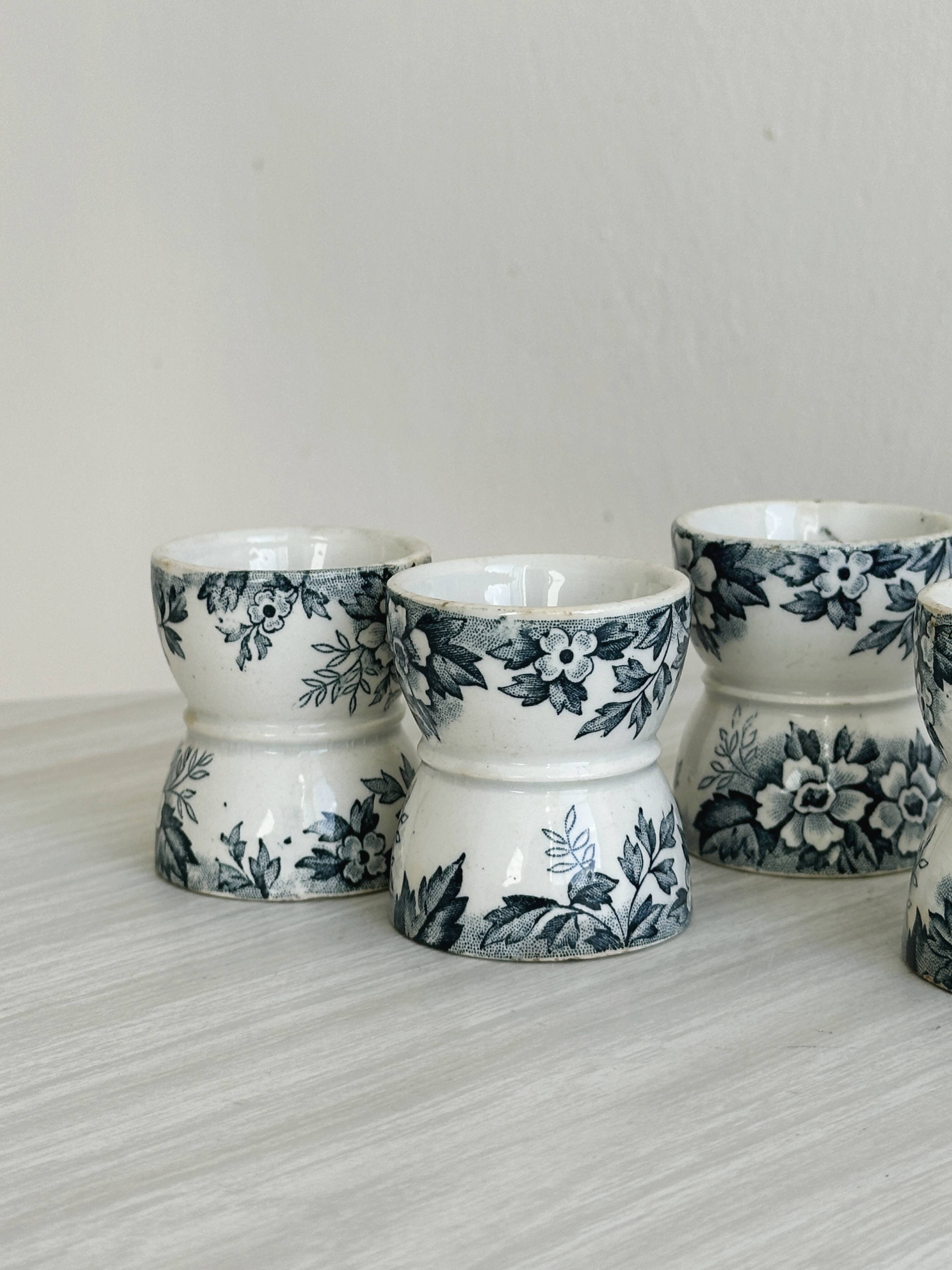 Set of 4 antique earthenware egg cups