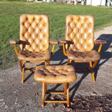 Paire de fauteuils cuir de style chesterfield