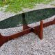 Designer coffee table by Hugues Poignant in rosewood and smoked glass from the 70s