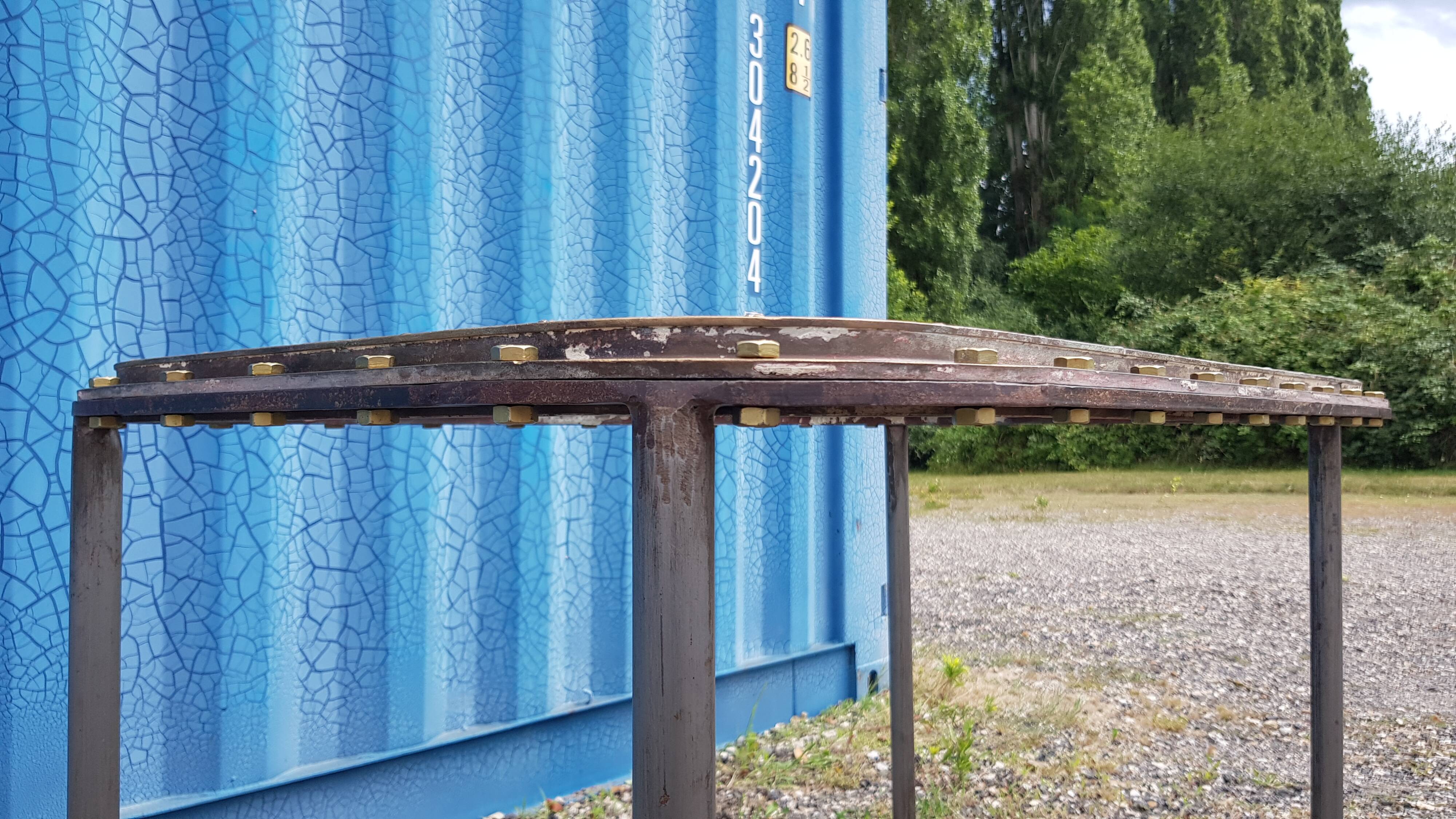 Table with an old ship porthole in brass and a metal base / 110 x 70 x 76 cm