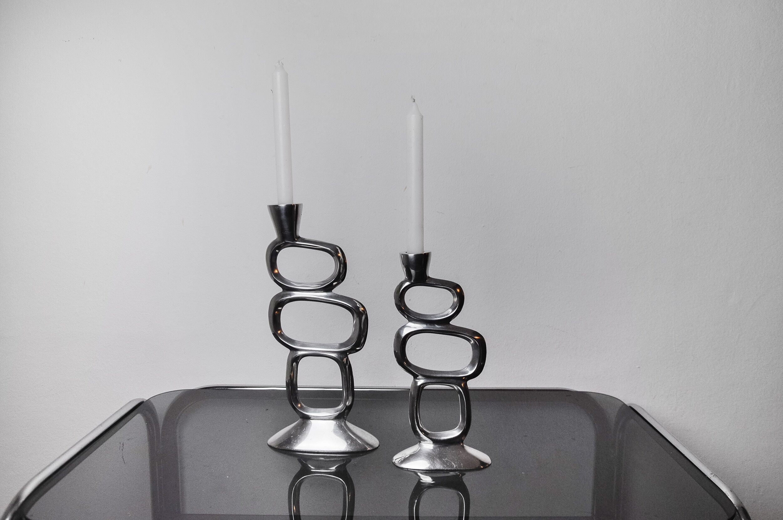 Pair of circle candlesticks by Matthew Hilton, England, 1980
