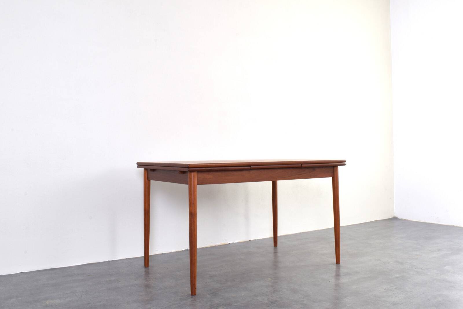 Mid-century Danish teak extendable dining table, 1960s.