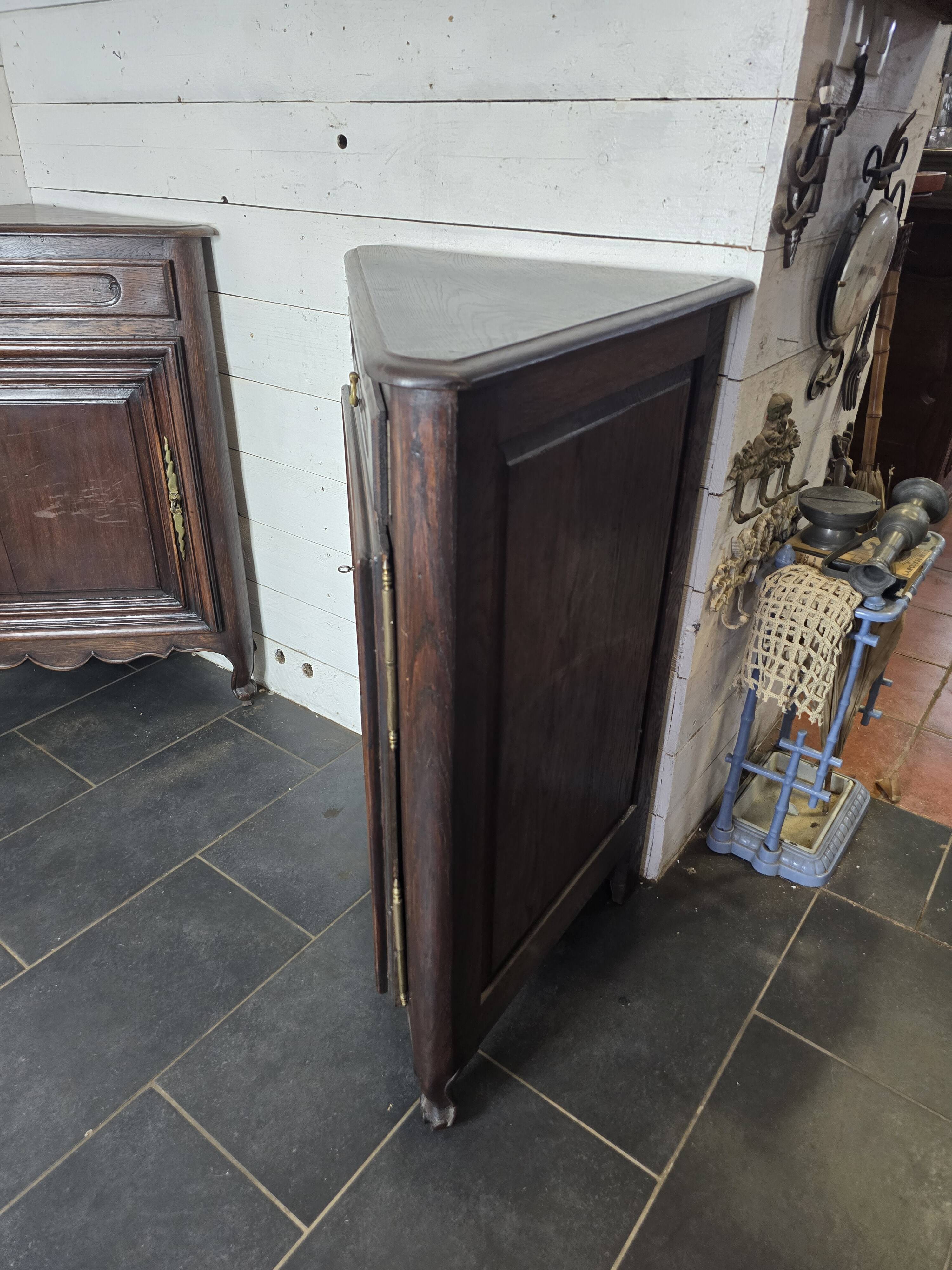 Pair of oak corner cabinets