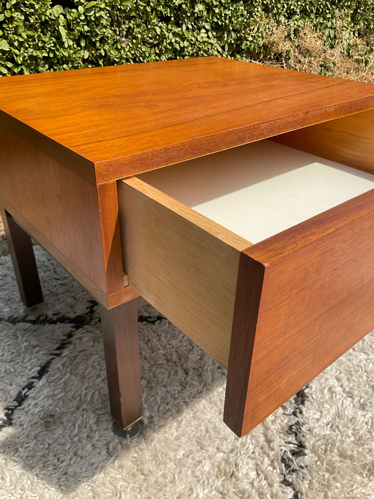 Vintage bedside table from the 60s-70s in teak.