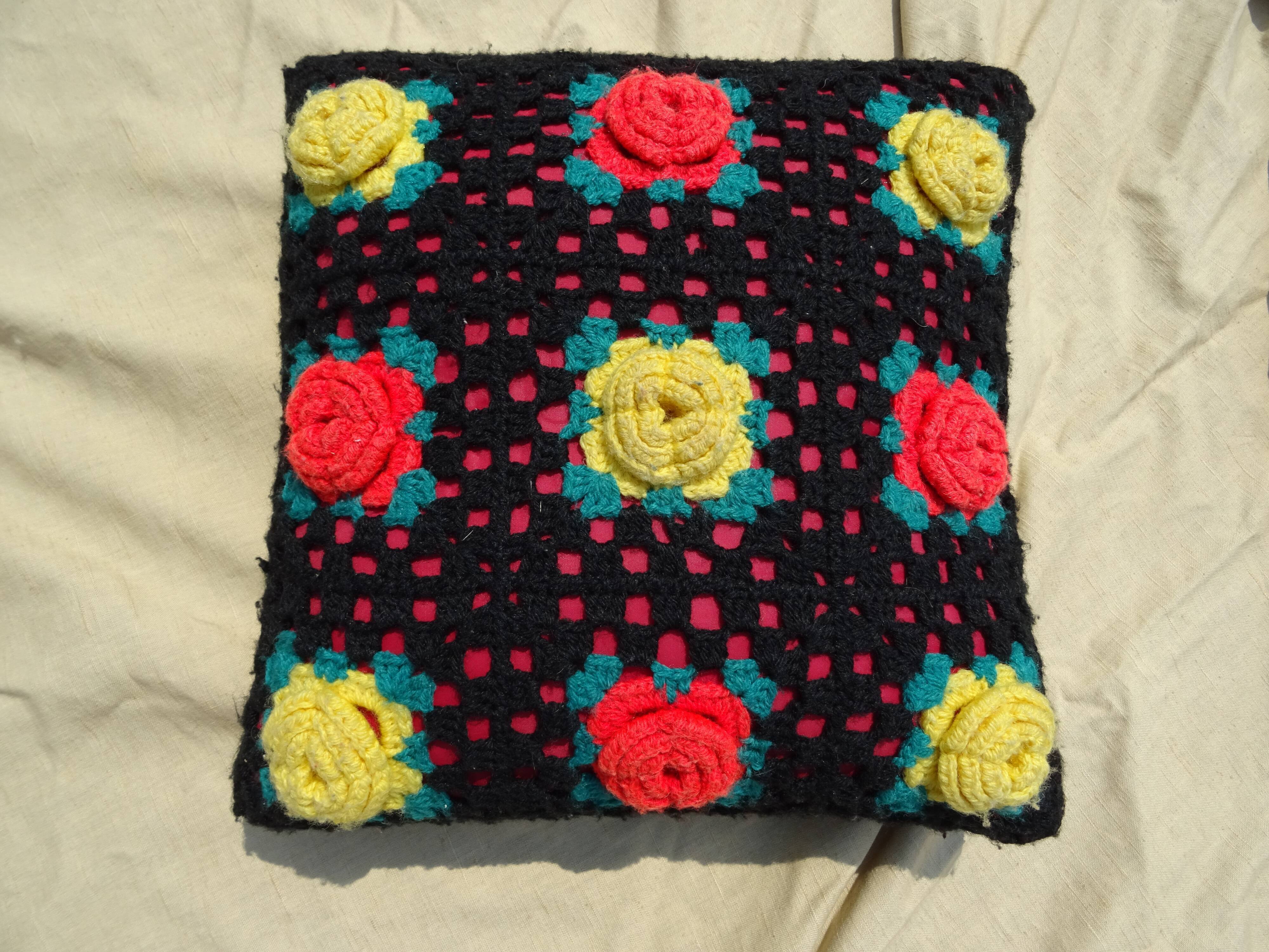 Wool cushion with vintage crochet