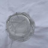 Small glass vase with leaf pattern.