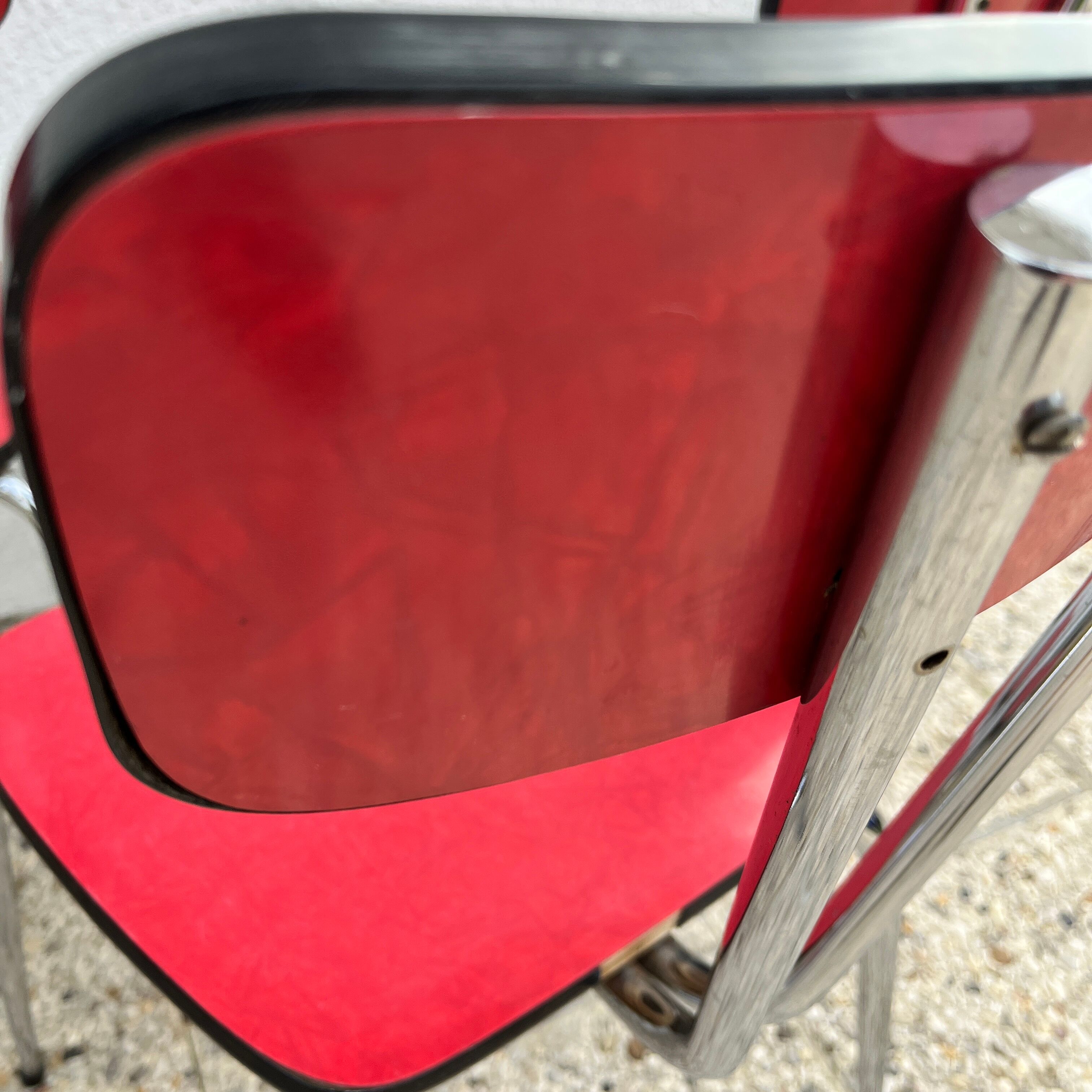 Chairs in formica red foot compass
