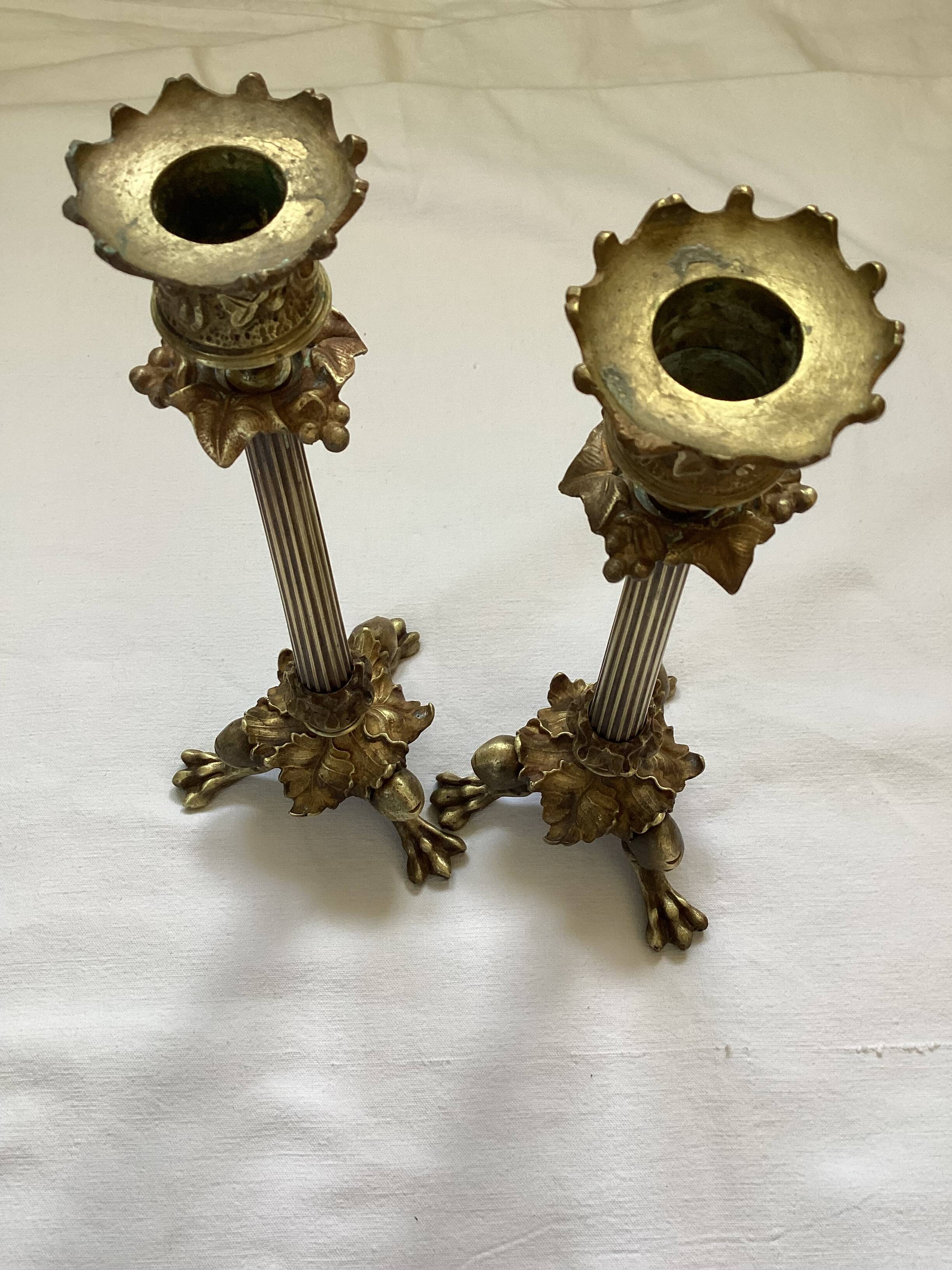 Old pair of bronze candlesticks