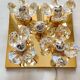 Brass wall lamp with glass prisms