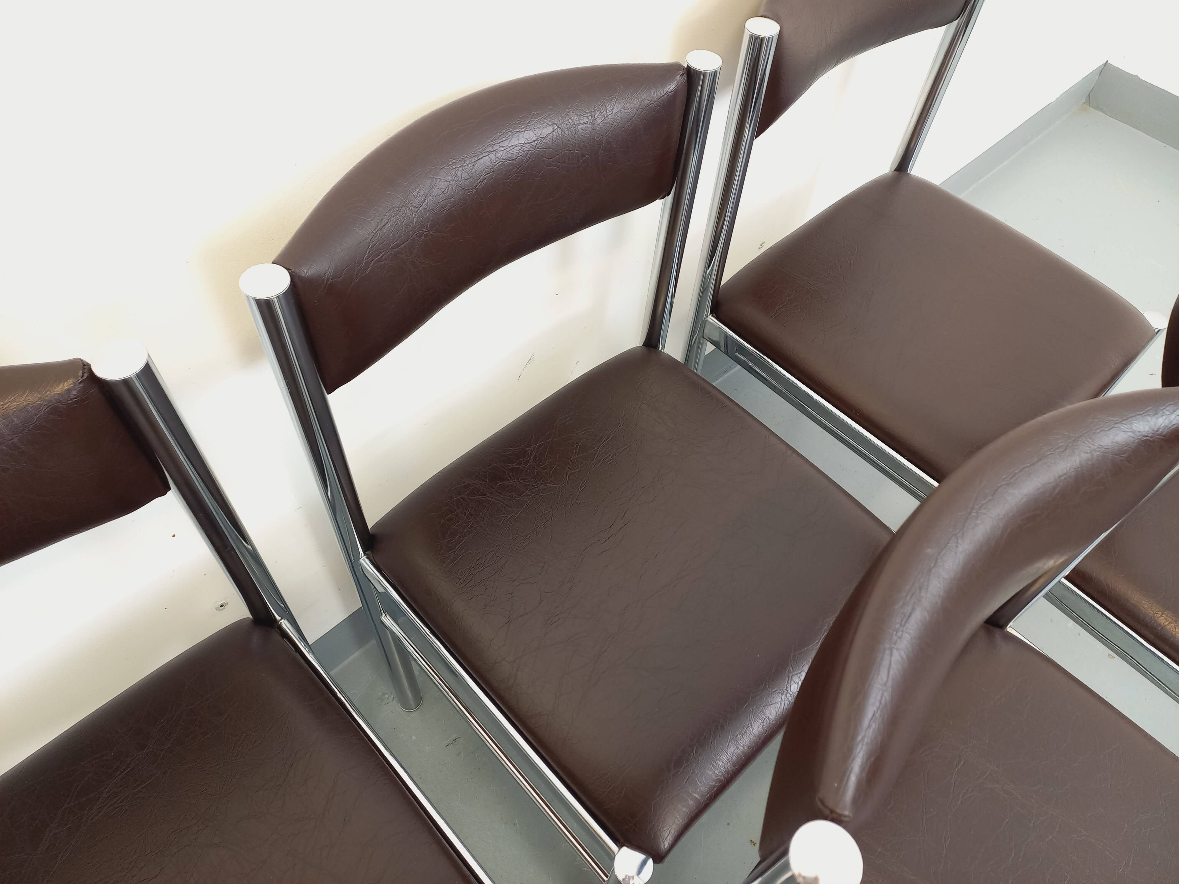 Set of 6 vintage chairs from the 70s in chrome metal and brown faux leather.