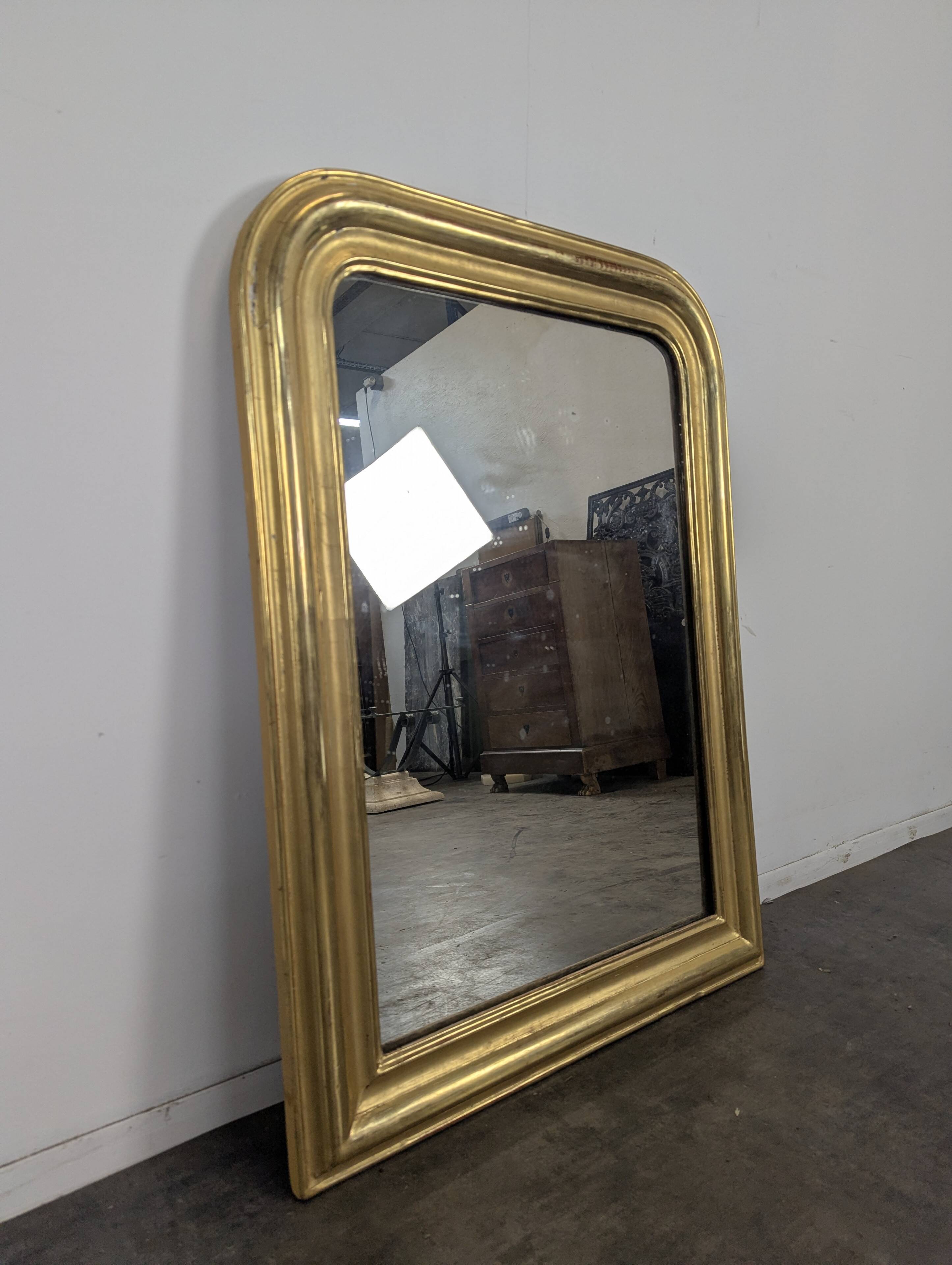 Golden mirror from the Louis Philippe period.