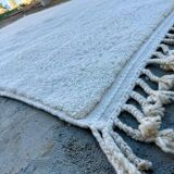 Simple white handmade rug 250cm x 150cm
