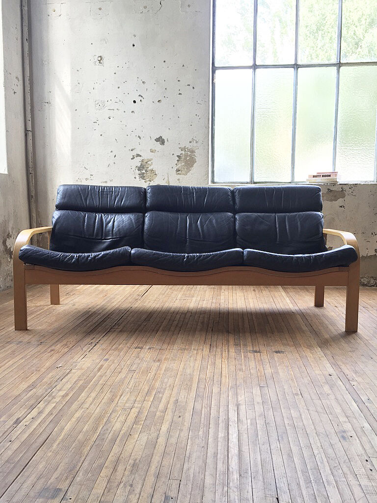 Danish sofa and armchairs curved wood and leather