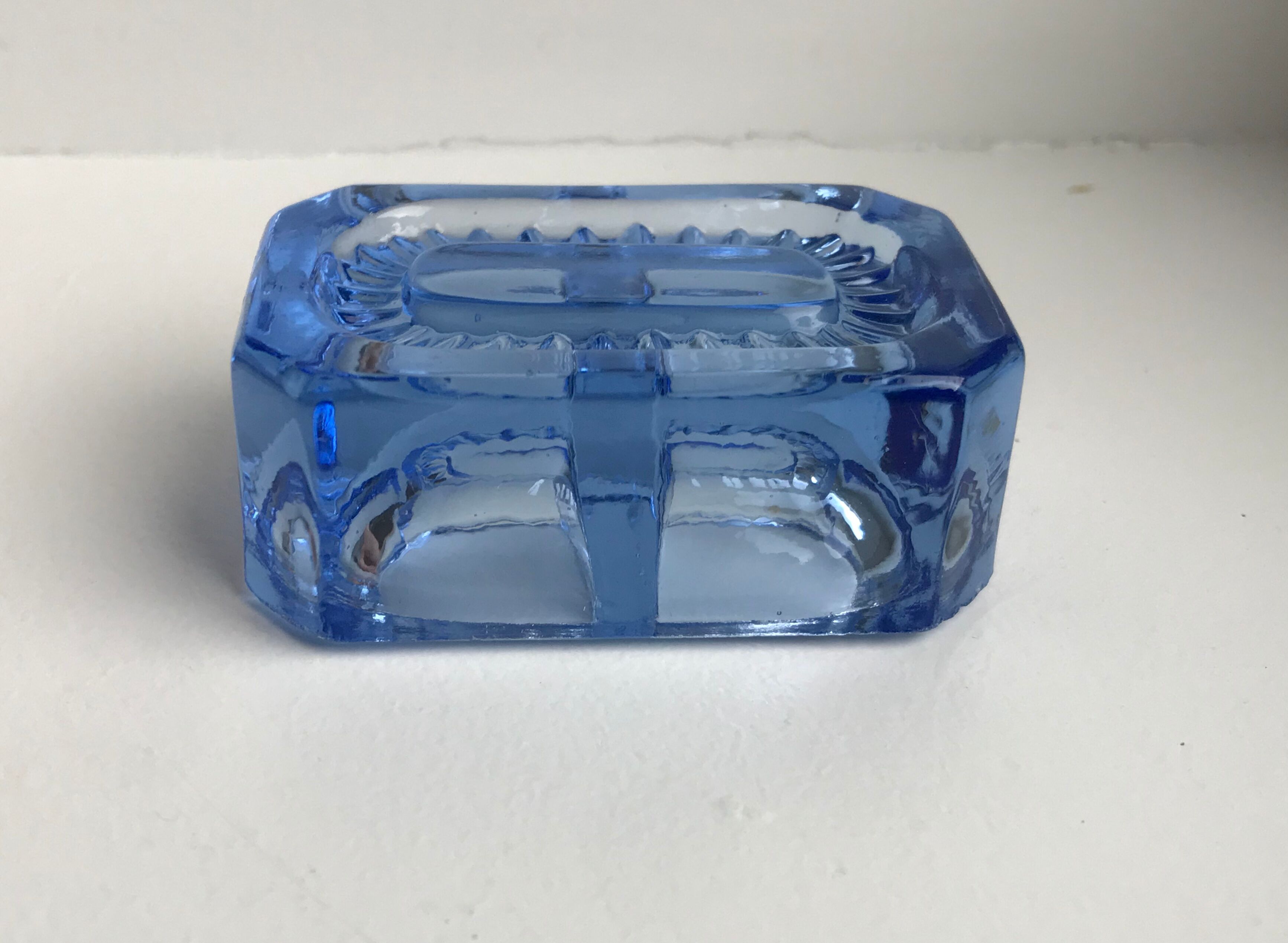 Salt shaker in electric blue molded glass