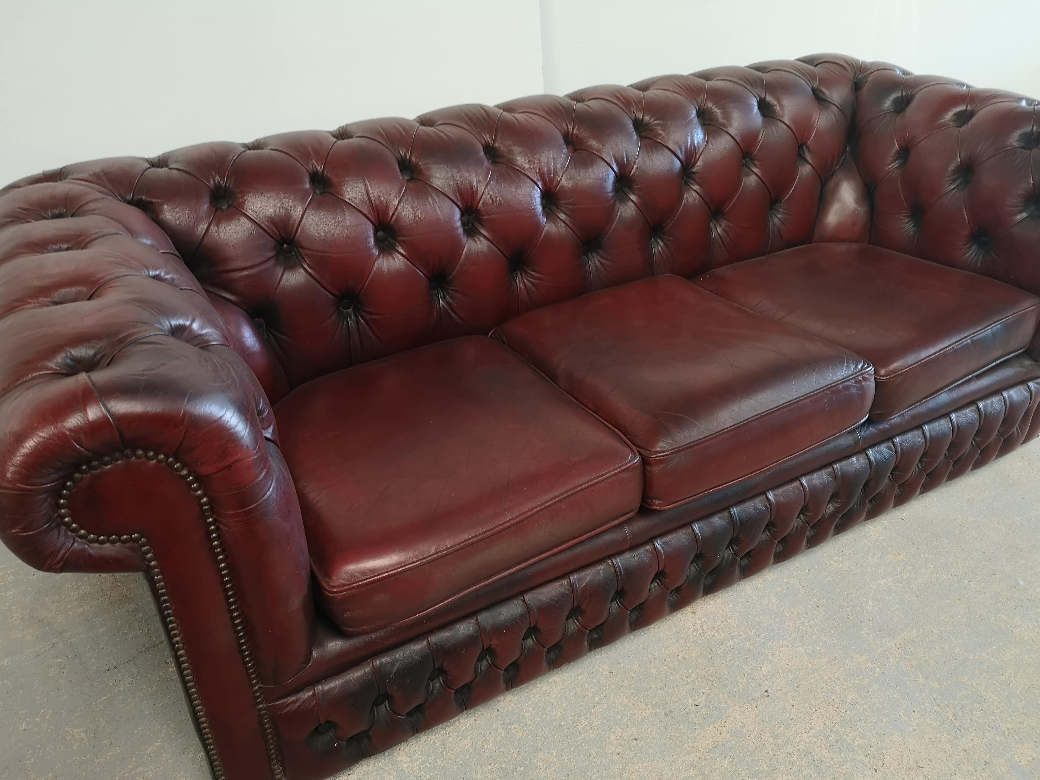 Burgundy leather chesterfield sofa