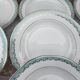 Set of 12 Longwy France earthenware soup plates, Trianon model