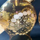 Pair of vintage wall sconces in brass with amber glass globes.