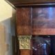 Directoire style bookcase in mahogany, decorated with gilded bronze.