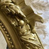 Miroir ancien ovale doré – style Louis XVI avec nœud ruban