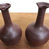 pair of terracotta bottles or carafes