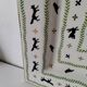 Large square dish RB Bernarda with animal decoration.