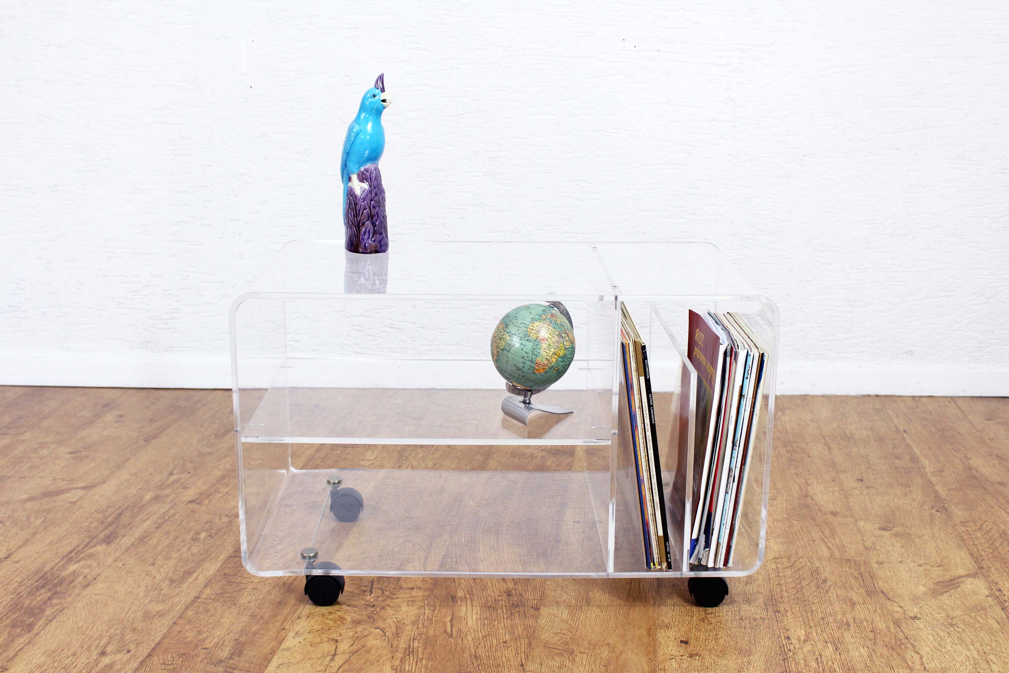 Plexiglas coffee table with vinyl compartment and magazines rack