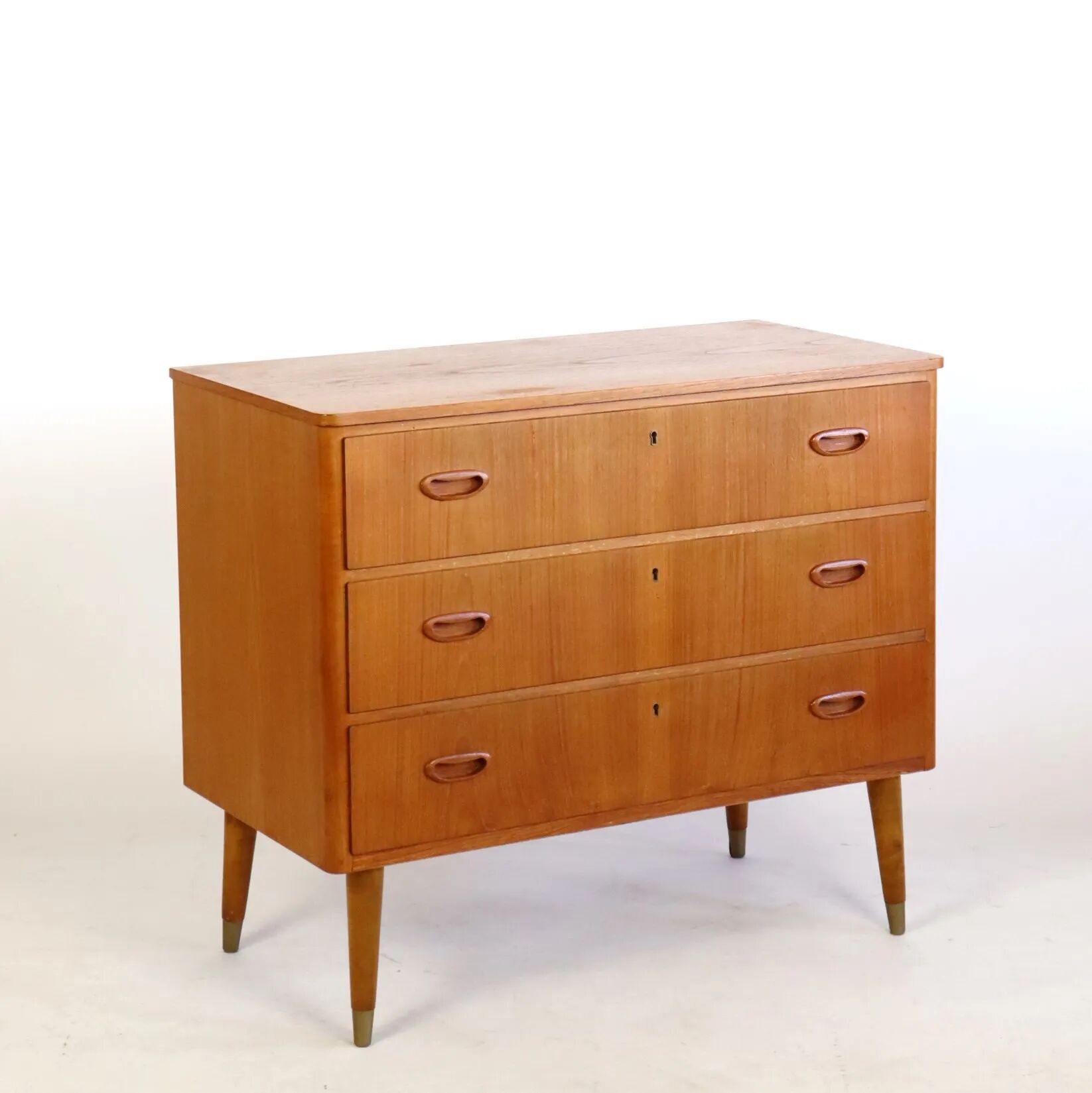 Commode en teck trois tiroirs