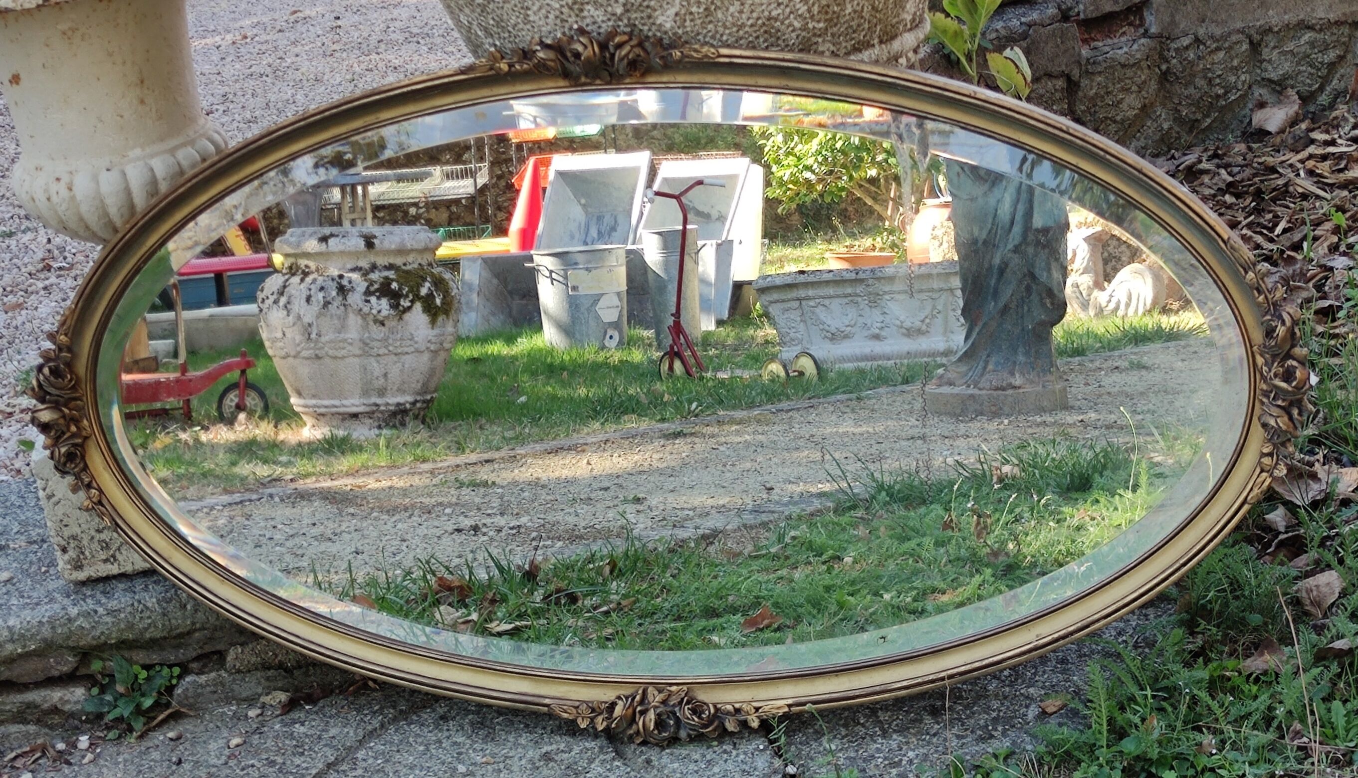 Ancien miroir ovale décor floral