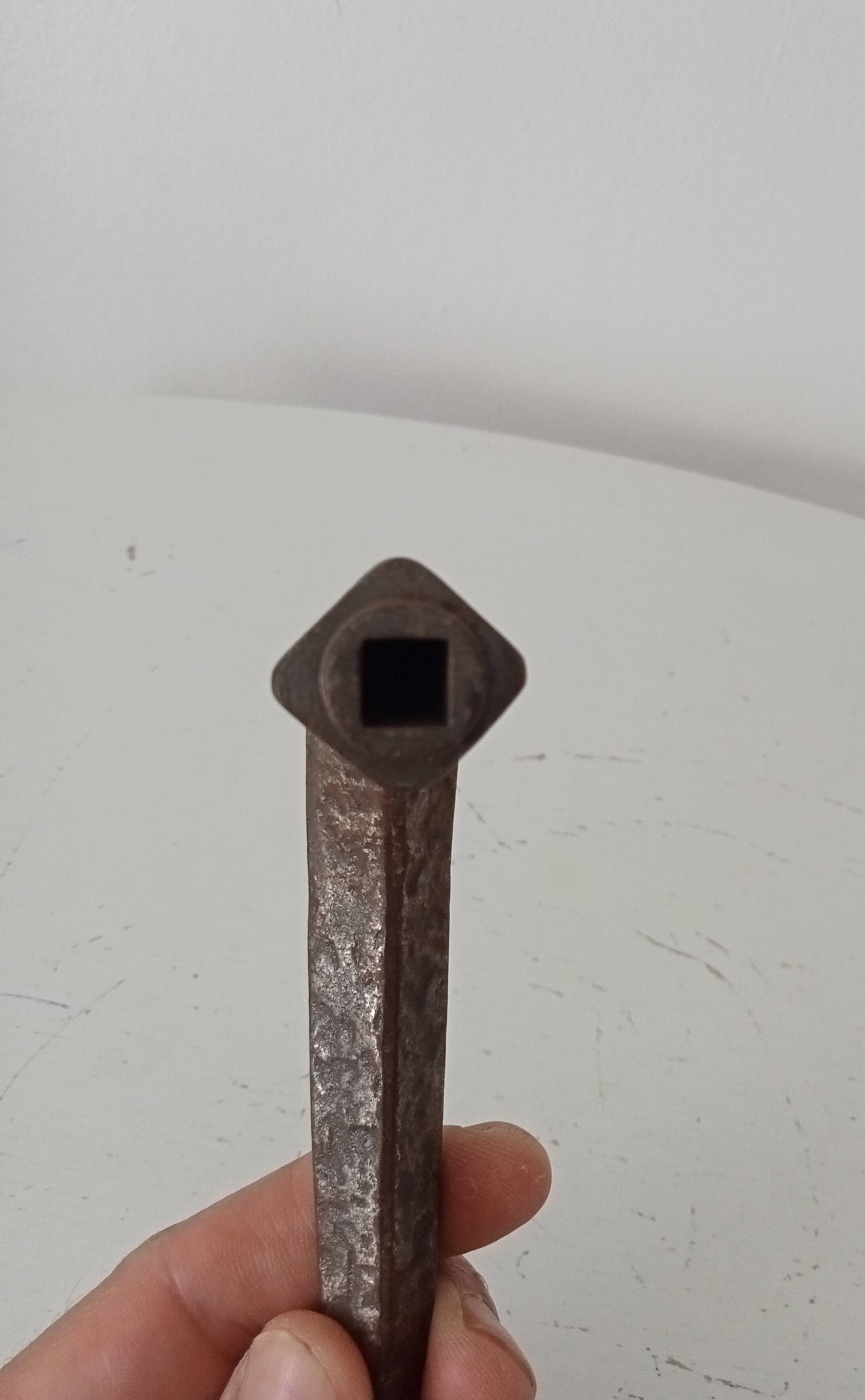 19th-century antique door handle in forged steel