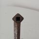 19th-century antique door handle in forged steel