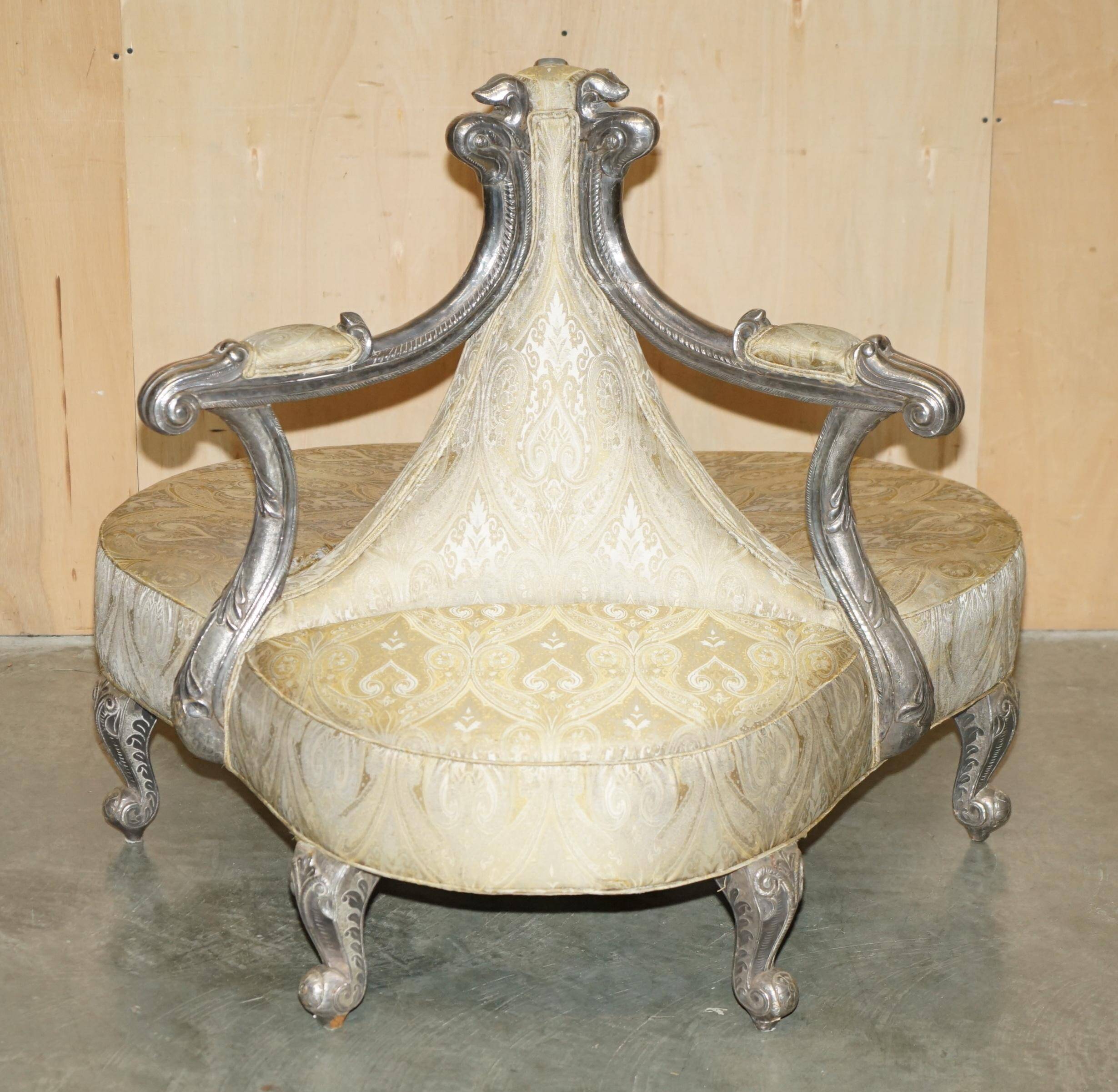 Silver-plated sculpted "Tete a Tete" canapé conversation, antique 19th century.
