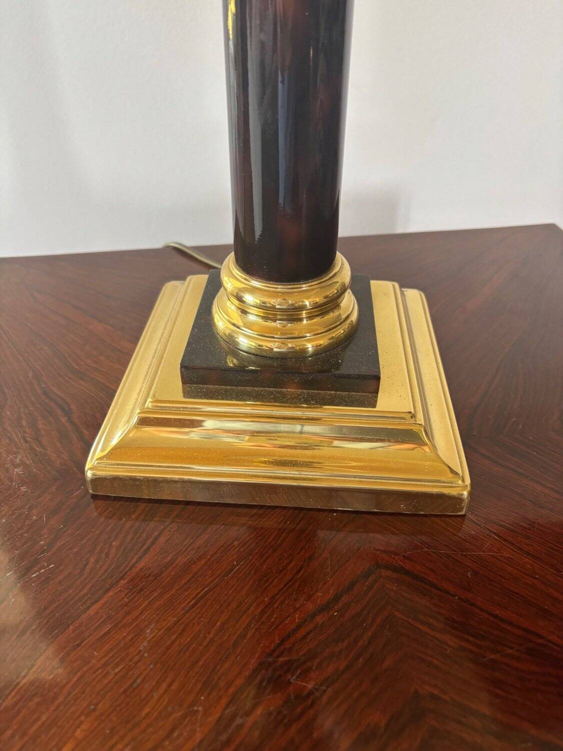 Empire style table lamp, gilded brass and black lacquered.