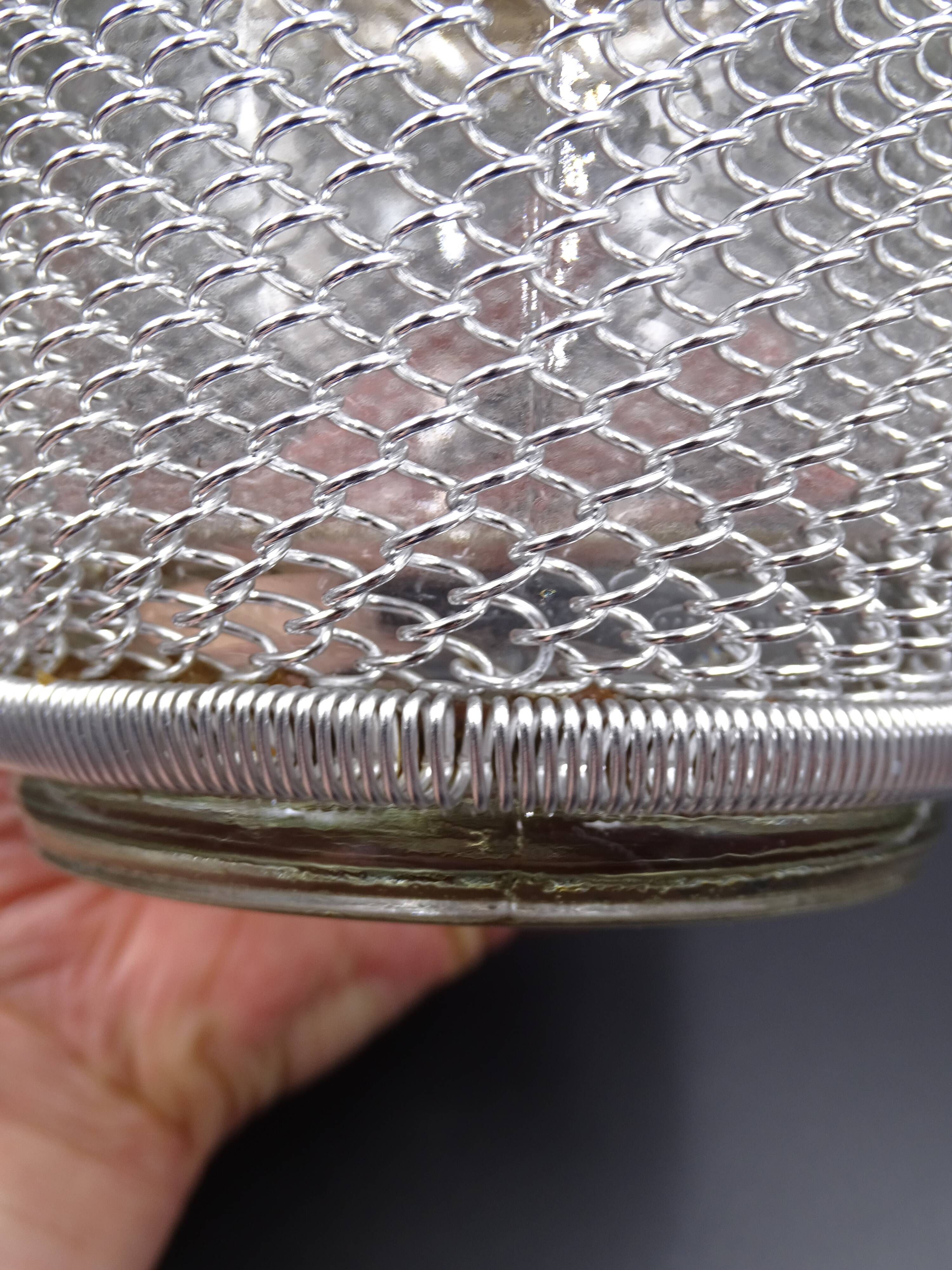 Screened ice bucket, circa 1970