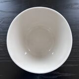 Flower pot with floral decoration in slip