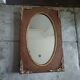 Oval and gold Art Deco mirror