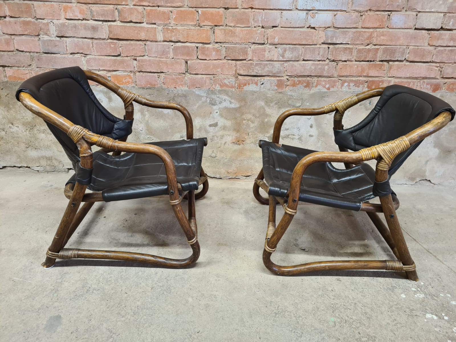 Pair of vintage skaï bamboo armchairs