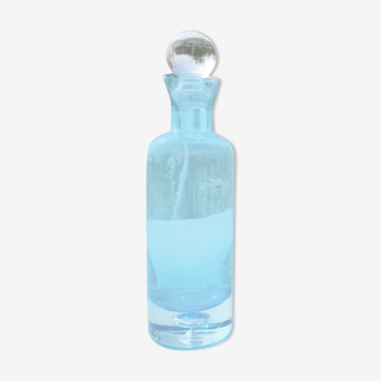 Bottle bottle and blue glass cap