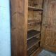 Antique rustic wardrobe in raw wood