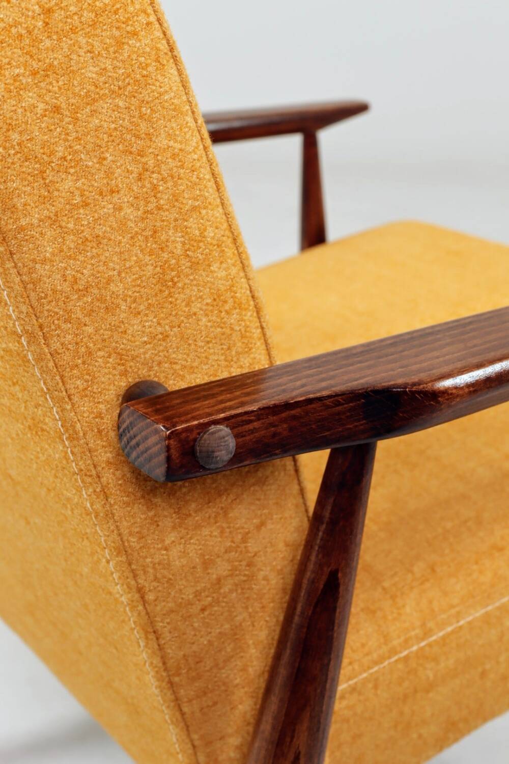 Vintage amber armchair Hermes designed by H. Lis